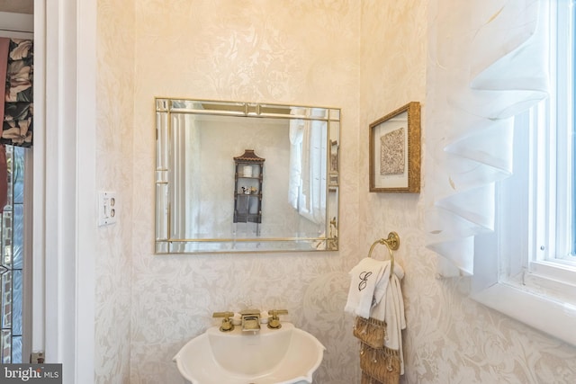 3851 Fawn Ln, White Plains, MD 20695 - bathroom featuring a sink and wallpapered walls