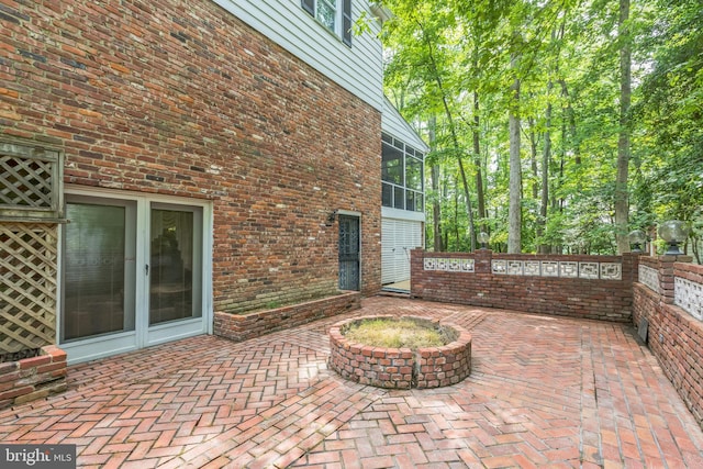 3851 Fawn Ln, White Plains, MD 20695 - view of patio featuring a sunroom