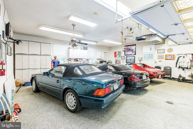 3851 Fawn Ln, White Plains, MD 20695 - garage with a garage door opener and ceiling fan