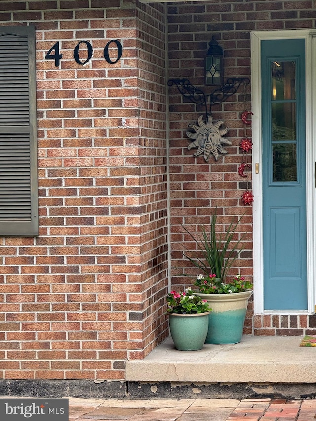 400 27th St, Huntingdon, PA 16652 - property entrance featuring brick siding