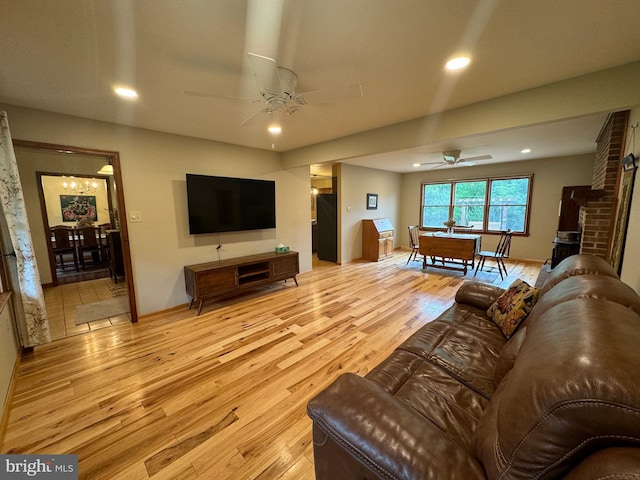 400 27th St, Huntingdon, PA 16652 - living room with ceiling fan, light wood finished floors, and recessed lighting