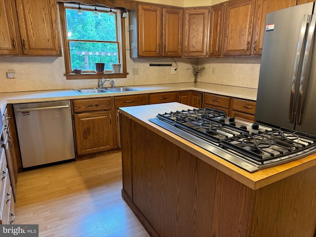 400 27th St, Huntingdon, PA 16652 - kitchen with stainless steel appliances, brown cabinets, and light countertops