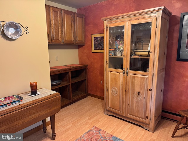 400 27th St, Huntingdon, PA 16652 - interior space with light wood finished floors and a baseboard radiator
