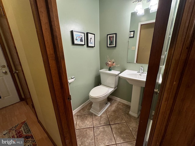 400 27th St, Huntingdon, PA 16652 - half bath with toilet and tile patterned floors