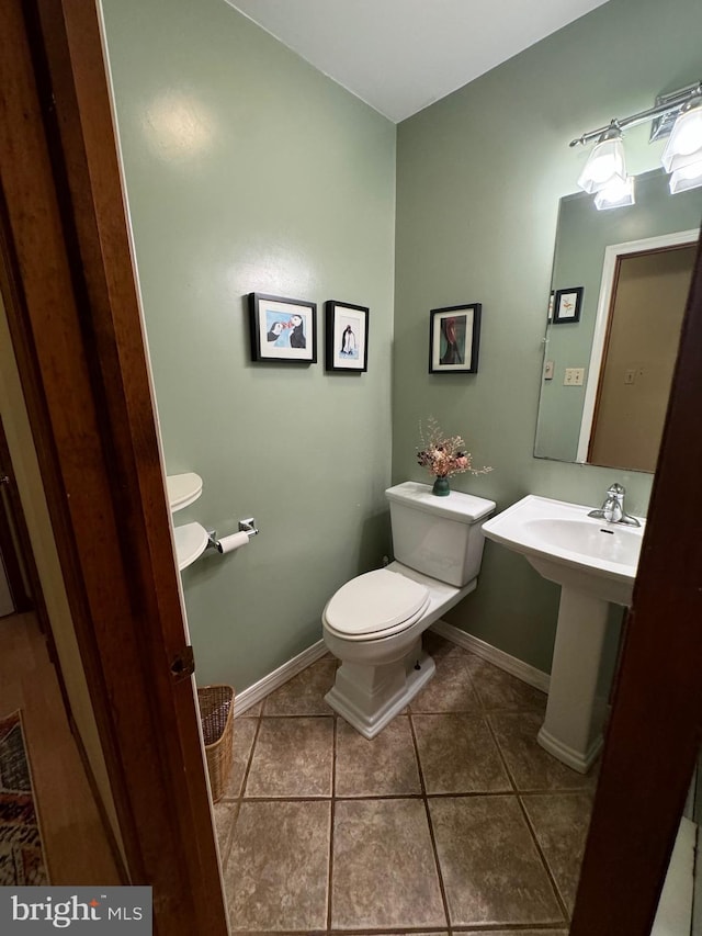 400 27th St, Huntingdon, PA 16652 - bathroom featuring toilet and tile patterned flooring