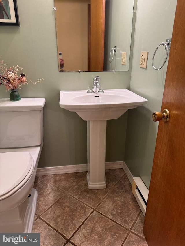 400 27th St, Huntingdon, PA 16652 - bathroom featuring a baseboard radiator and tile patterned floors