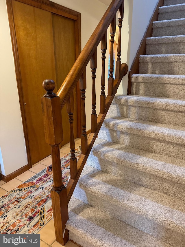 400 27th St, Huntingdon, PA 16652 - stairway featuring tile patterned floors