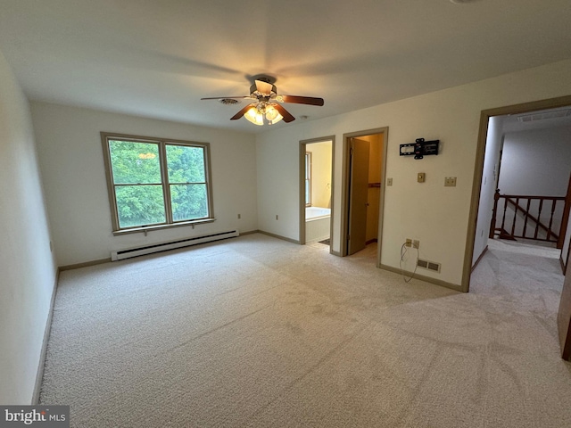 400 27th St, Huntingdon, PA 16652 - empty room featuring baseboard heating, light carpet, and a ceiling fan