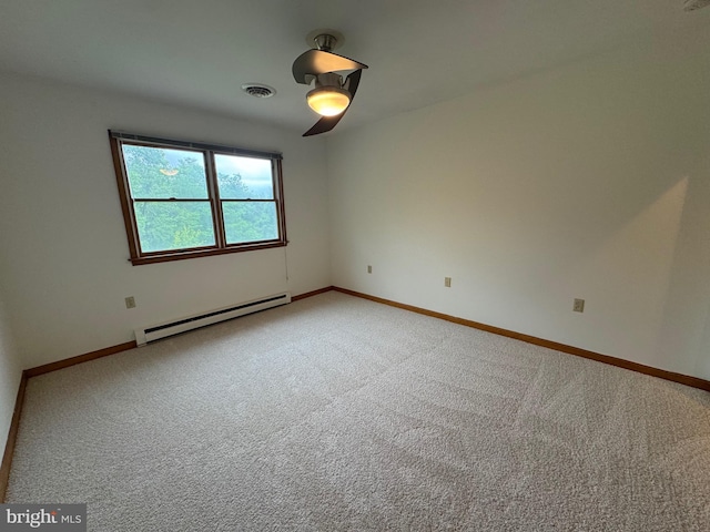 400 27th St, Huntingdon, PA 16652 - empty room with a baseboard radiator and light carpet