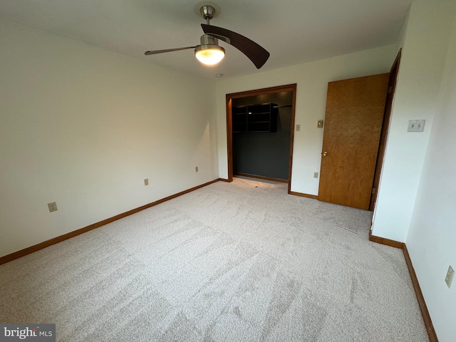 400 27th St, Huntingdon, PA 16652 - unfurnished bedroom with light carpet, a closet, and ceiling fan