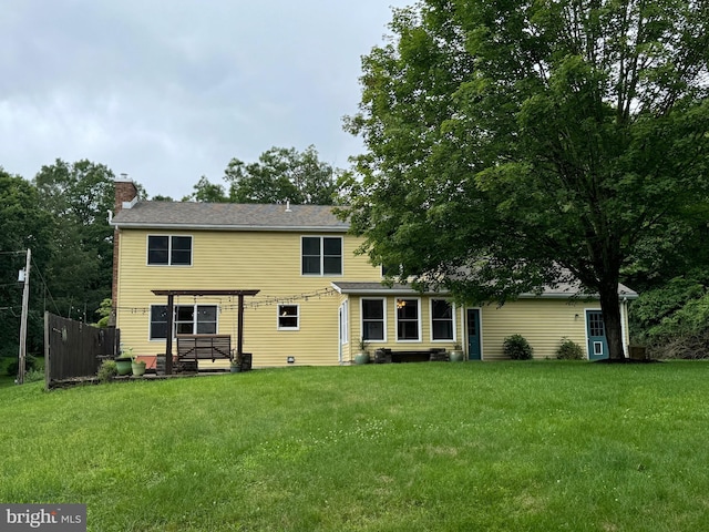 400 27th St, Huntingdon, PA 16652 - back of property with a chimney and a yard