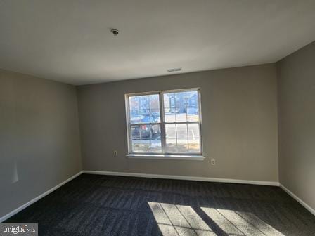 337 Nicholas Dr, Riverside, NJ 08075 - spare room featuring dark carpet and baseboards