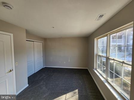 337 Nicholas Dr, Riverside, NJ 08075 - unfurnished bedroom featuring carpet and a closet