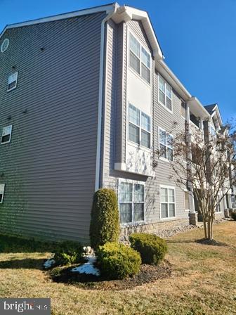 337 Nicholas Dr, Riverside, NJ 08075 - view of home's exterior with a yard
