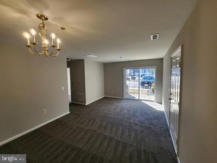 337 Nicholas Dr, Riverside, NJ 08075 - empty room with a chandelier and dark colored carpet