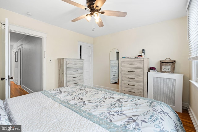 1123 Maple St, Conshohocken, PA 19428 - bedroom with wood finished floors, radiator, and ceiling fan