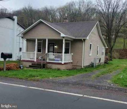 15402 Mount Savage NW, Mount Savage, MD 21545 - view of front of property with covered porch and a chimney