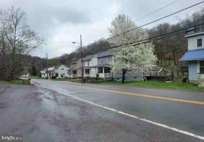 15402 Mount Savage NW, Mount Savage, MD 21545 - view of asphalt road with street lights and a residential view