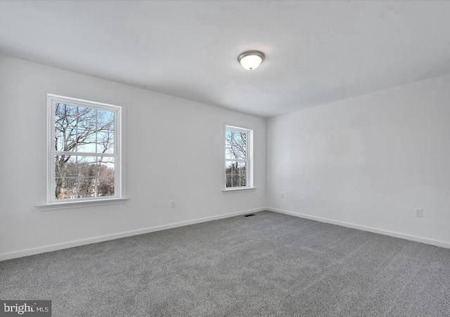 21 American Ave, Carlisle, PA 17013 - unfurnished room with baseboards and dark carpet