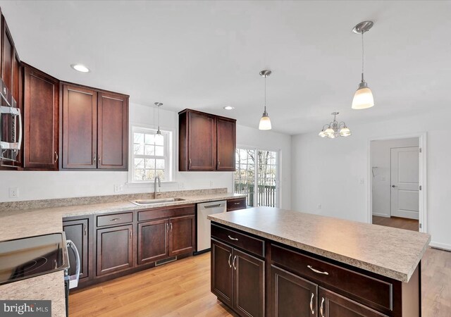 21 American Ave, Carlisle, PA 17013 - kitchen with appliances with stainless steel finishes, plenty of natural light, light wood-style flooring, a chandelier, and recessed lighting