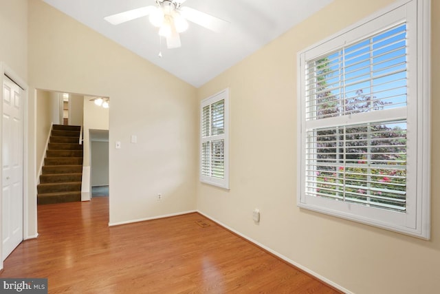 13 Gelding Ct, Olney, MD 20832 - unfurnished room with wood finished floors, ceiling fan, stairs, and lofted ceiling