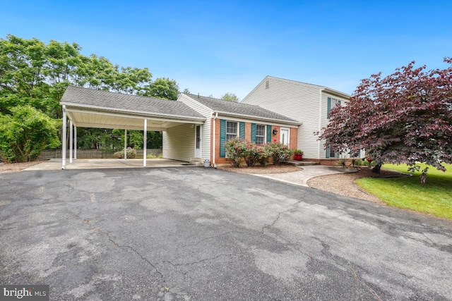 13 Gelding Ct, Olney, MD 20832 - view of front facade with asphalt driveway and a shingled roof