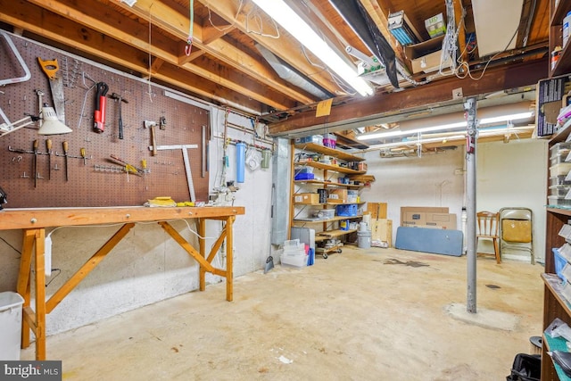 13 Gelding Ct, Olney, MD 20832 - unfinished basement featuring a workshop area