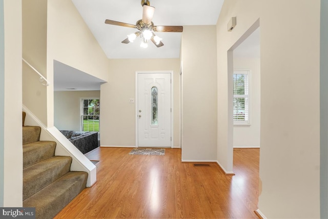 13 Gelding Ct, Olney, MD 20832 - foyer with ceiling fan, stairs, light wood-style floors, and high vaulted ceiling