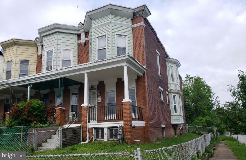 1640 N Ellamont St, Baltimore, MD 21216 - multi unit property featuring brick siding and covered porch
