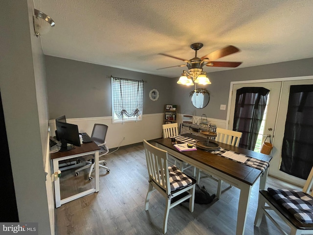 1105 Darlington Rd, Beaver Falls, PA 15010 - office space with a textured ceiling, a wainscoted wall, a ceiling fan, wood finished floors, and french doors