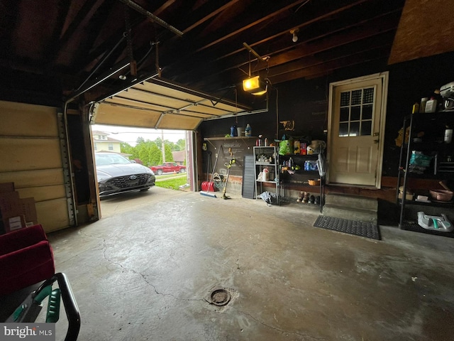 1105 Darlington Rd, Beaver Falls, PA 15010 - garage featuring a garage door opener