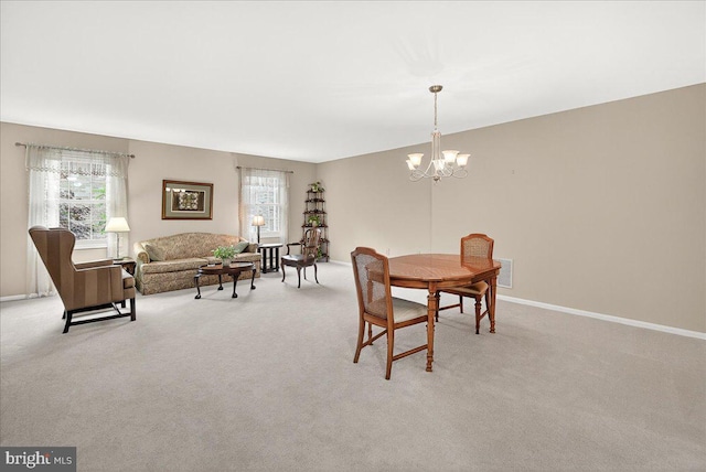 7504 Westlake Ter Unit 25, Bethesda, MD 20817 - carpeted dining room with plenty of natural light and a chandelier