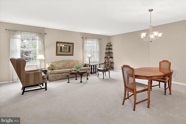 7504 Westlake Ter Unit 25, Bethesda, MD 20817 - dining area with a chandelier and light colored carpet