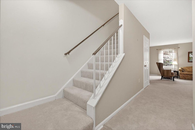7504 Westlake Ter Unit 25, Bethesda, MD 20817 - stairway featuring carpet