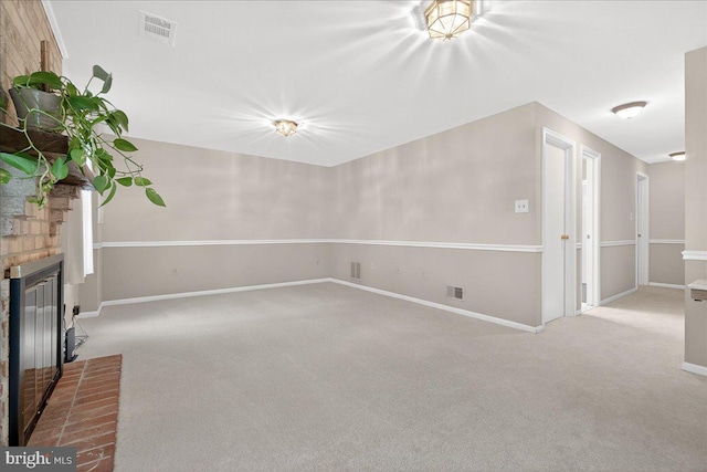 7504 Westlake Ter Unit 25, Bethesda, MD 20817 - unfurnished living room featuring light carpet and a fireplace