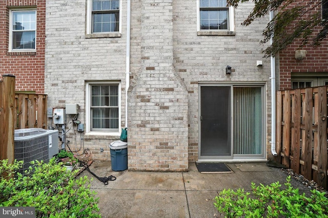 7504 Westlake Ter Unit 25, Bethesda, MD 20817 - doorway to property with brick siding