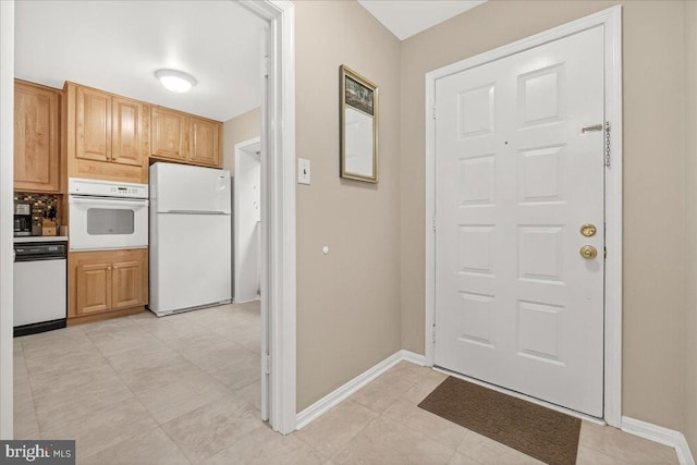 7504 Westlake Ter Unit 25, Bethesda, MD 20817 - kitchen featuring white appliances and baseboards