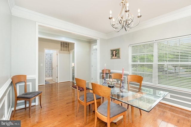 1404 Preserve Ln, Fredericksburg, VA 22401 - dining area with crown molding, a chandelier, and light wood-style floors