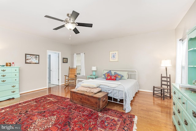 1404 Preserve Ln, Fredericksburg, VA 22401 - bedroom featuring light wood-style floors, multiple windows, and a ceiling fan