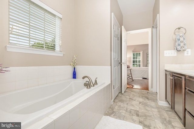 1404 Preserve Ln, Fredericksburg, VA 22401 - ensuite bathroom featuring a garden tub and vanity