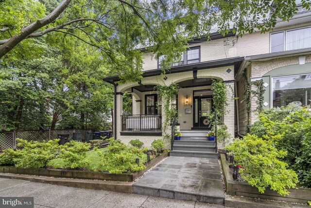 2819 Bellevue Ter NW, Washington, DC 20007 - view of front of home featuring a porch and brick siding