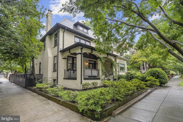 2819 Bellevue Ter NW, Washington, DC 20007 - traditional style home featuring a chimney and covered porch