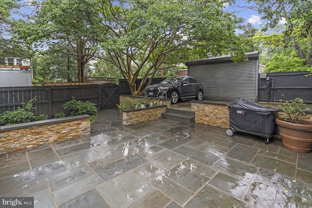 2819 Bellevue Ter NW, Washington, DC 20007 - fenced backyard with a gate and a patio area