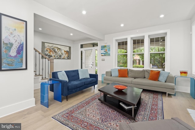 2819 Bellevue Ter NW, Washington, DC 20007 - living room with wood finished floors, recessed lighting, and stairway