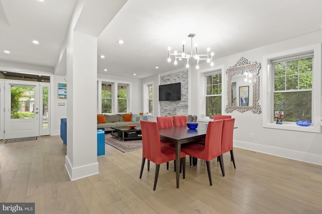 2819 Bellevue Ter NW, Washington, DC 20007 - dining room featuring light wood finished floors, healthy amount of natural light, recessed lighting, and a chandelier