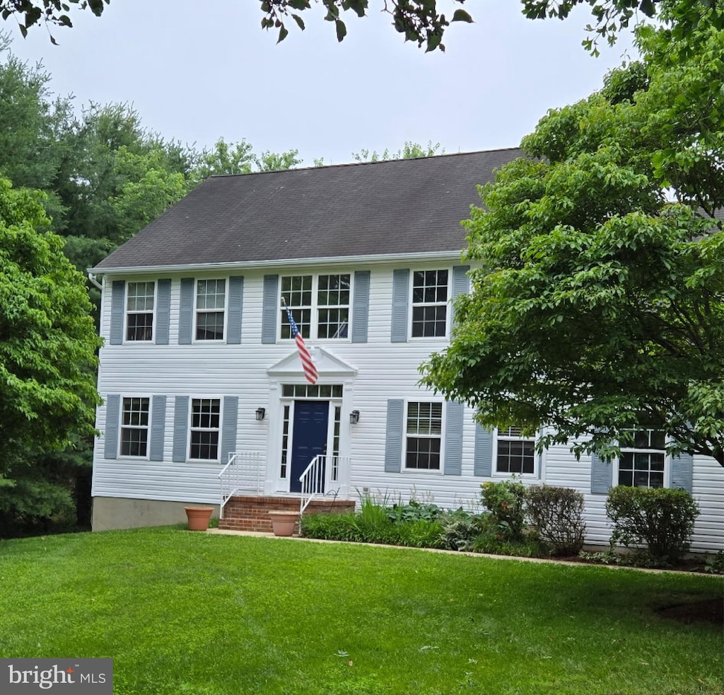 3040 Jones Rd, Dunkirk, MD 20754 - colonial-style house featuring a front yard