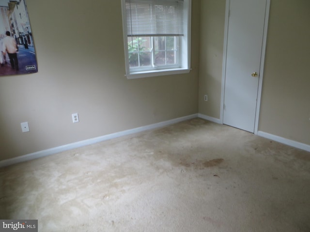 6915 Victoria Dr Unit C, Alexandria, VA 22310 - carpeted empty room with baseboards