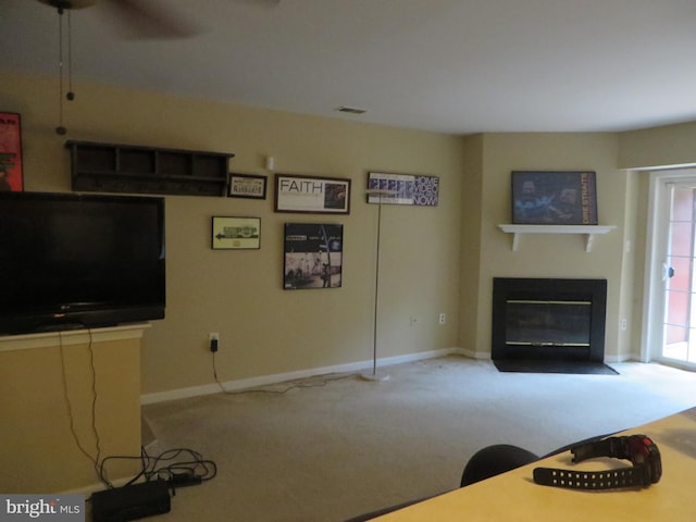 6915 Victoria Dr Unit C, Alexandria, VA 22310 - carpeted living room featuring a fireplace with flush hearth and ceiling fan