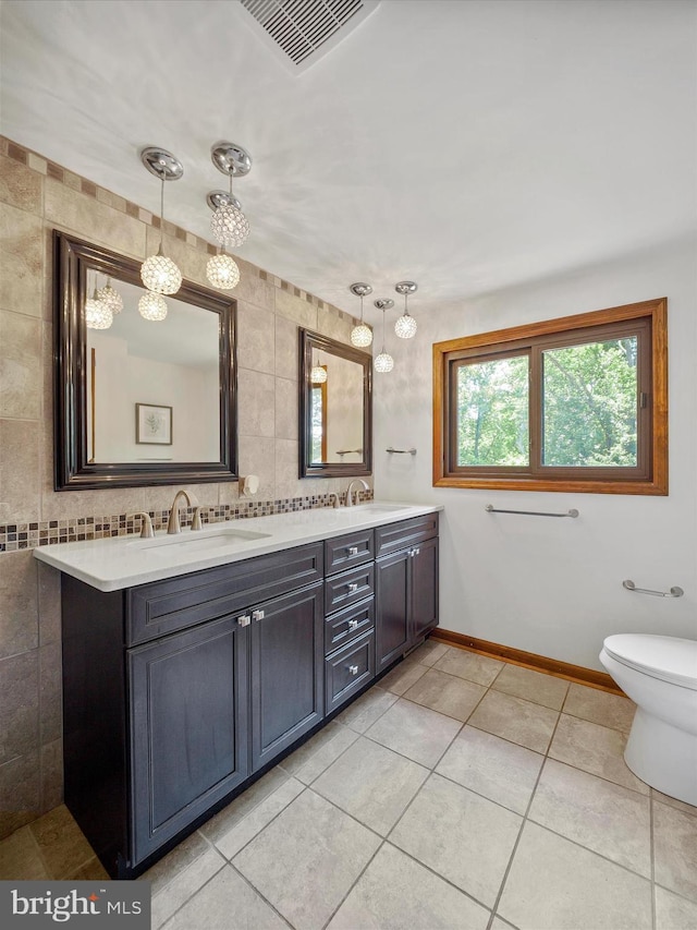 258 Merrimack, Falling Waters, WV 25419 - full bathroom with double vanity, tile patterned floors, and tasteful backsplash