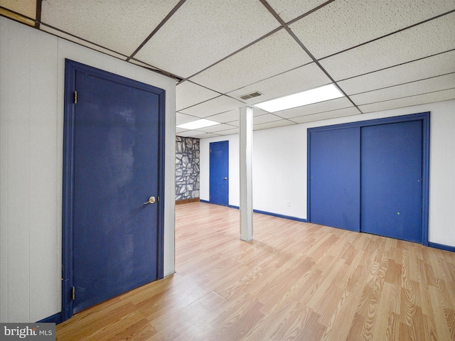 258 Merrimack, Falling Waters, WV 25419 - empty room with a paneled ceiling and wood finished floors